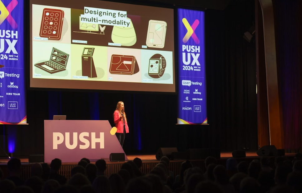 Kelly Dern speaking on stage